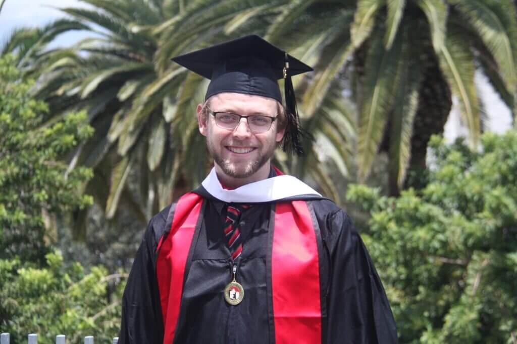 Nick at his college graduation after receiving treatment at the Ivy Brain Tumor Center thanks to generous brain cancer donations