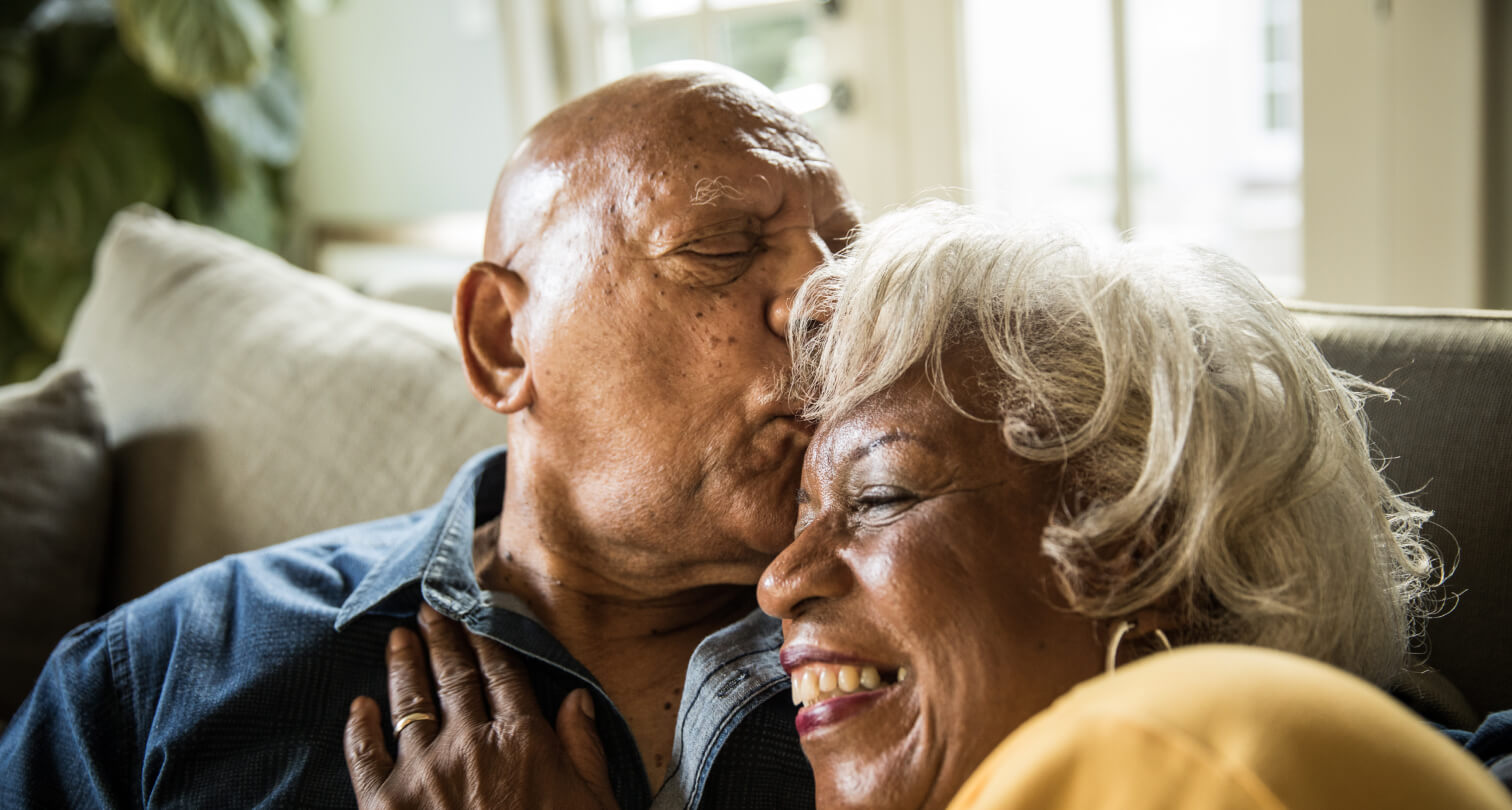 older couple kissing